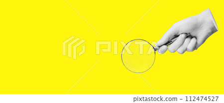Magnifying glass, lens in hand for search, find, study, yellow banner background with copy space Magnifying glass, lens in hand for search, find, study, yellow banner background with copy space 112474527