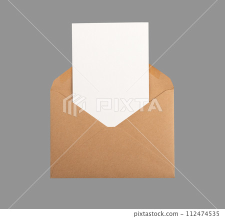 Postcard, vertical card mock up, clean paper sheet from open kraft envelope isolated on white 112474535