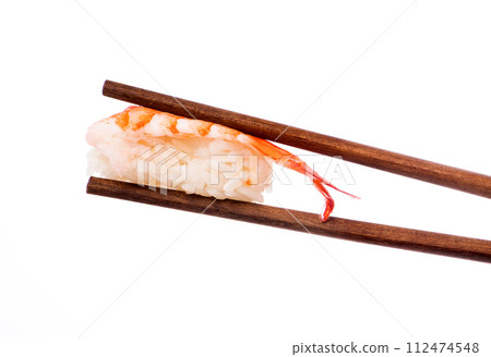 Sushi Sushi in chopsticks 112474548