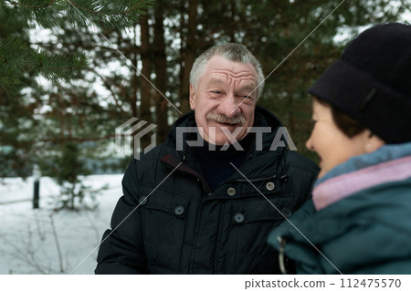 Mature husband and wife love each other and walk even in cold weather Mature husband and wife love each other and walk even in cold weather 112475570