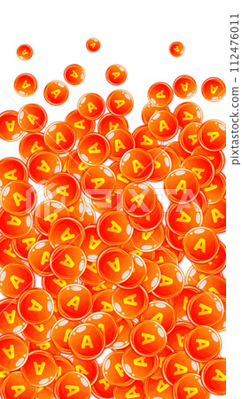 Vitamin A round capsules scattered randomly. 112476011