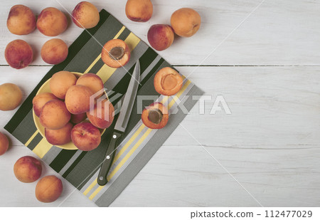 Fresh Flat lay. Top view.apricots. healthy fruit.Organic fruits. Healthy food. Top view. Fresh Flat lay. Top view.apricots. healthy fruit.Organic fruits. Healthy food. Top view. 112477029