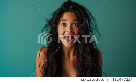 AI-generated content. A woman making a surprised face as her hair blows in the wind. 112477224