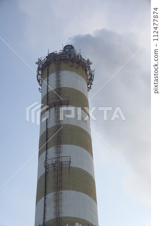 The main provides the city with hot water. Selective focus. The pipes of the central heating system 112477874