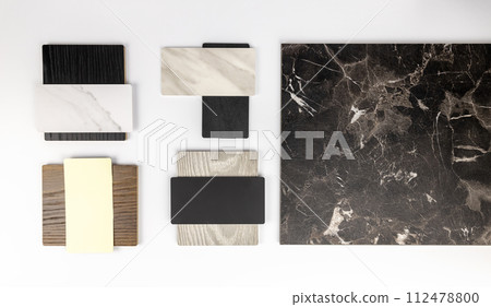 Black marble texture, a collection of stone samples and veneered wood-like p for your interior and design. Multicoloured and textured stone samples. Black marble texture, a collection of stone samples and veneered wood-like p for your interior and design. Multicoloured and textured stone samples. 112478800