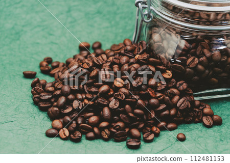 Coffee beans and glass bottle green background b-3-1 film style 112481153