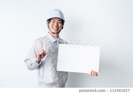 Men in work clothes/Message board 112481657