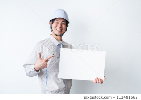 Men in work clothes/Message board 112481662