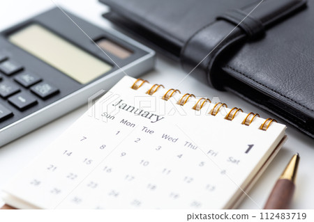 January calendar, calculator and notebook January calendar, calculator and notebook 112483719