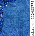 blue jeans background with torn texture 112483775