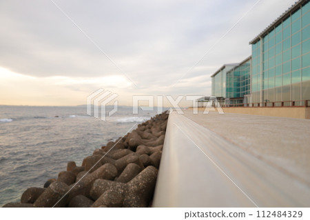 Scenery of coast with breakwater Scenery of coast with breakwater 112484329