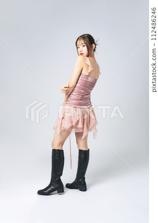 Fashion portrait of woman in fashionable outfit Fashion portrait of woman in fashionable outfit 112486246
