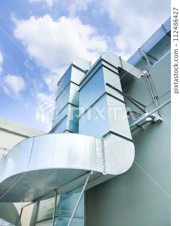 Ventilation and air conditioning pipe installed outside the building. Ventilation and air conditioning pipe installed outside the building. 112486427