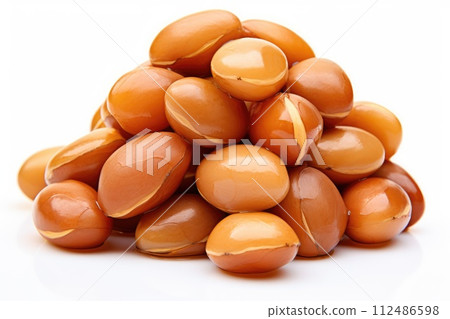 Argan seeds isolated on a white banner background. Generative A 112486598