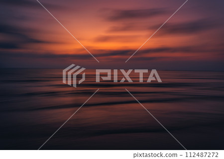 Sunset on the beach Beautiful colors of the sky and sea Sunset on the beach Beautiful colors of the sky and sea 112487272