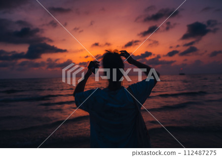 Beach and sea at dusk, beautiful colors and light before dark Beach and sea at dusk, beautiful colors and light before dark 112487275