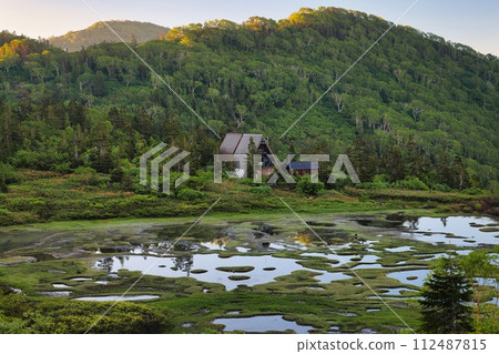 Mt. Hiuchi’s pond and mountain hut Mt. Hiuchi’s pond and mountain hut 112487815