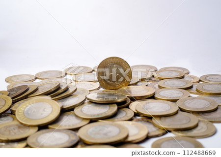 Pile of coins isolated on white background with copy space for text. Indian ten rupees coins 112488669