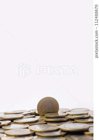Pile of coins isolated on white background with copy space for text. selected focus 112488670