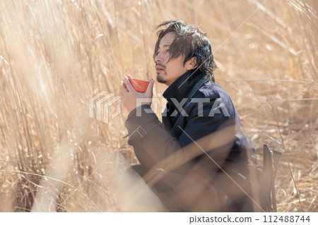 A man in his 30s doing outdoor activities A man in his 30s doing outdoor activities 112488744