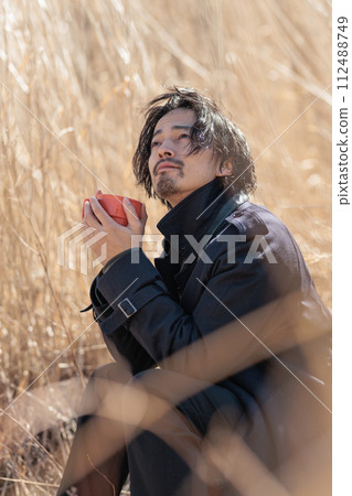 A man in his 30s doing outdoor activities A man in his 30s doing outdoor activities 112488749