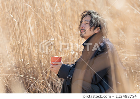 A man in his 30s doing outdoor activities A man in his 30s doing outdoor activities 112488754