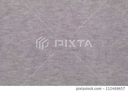 Soft Knitted Woolen Detailed Texture. Natural Fabric Closeup Knit Pattern. Gray Knitwear, Warm Cashmere Surface. Rotation, Macro. Cozy Textile Background. Clothes Production. Melange Yarn. 4K Shot 112489657