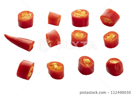 sliced red hot chili peppers isolated on a white background sliced red hot chili peppers isolated on a white background 112490030