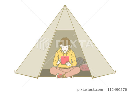 A woman in long sleeves and long pants is sitting cross-legged at the entrance of a tent and relaxing looking at a red tablet screen. A woman in long sleeves and long pants is sitting cross-legged at the entrance of a tent and relaxing looking at a red tablet screen. 112490276