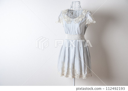 A dress worn on a torso A dress worn on a torso 112492193