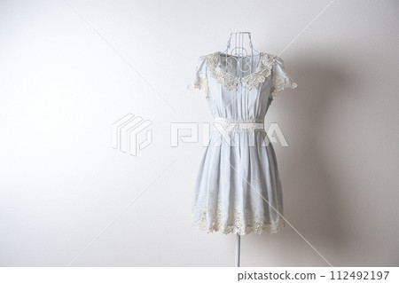 A dress worn on a torso A dress worn on a torso 112492197
