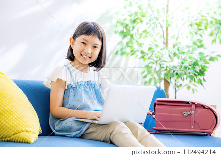 Elementary school student computer home 112494214