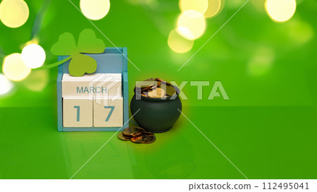 Save the date white block calendar for St Patrick's Day, March 17 on green background. Save the date white block calendar for St Patrick's Day, March 17 on green background. 112495041