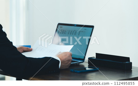 Male businessman scanning documents 112495855