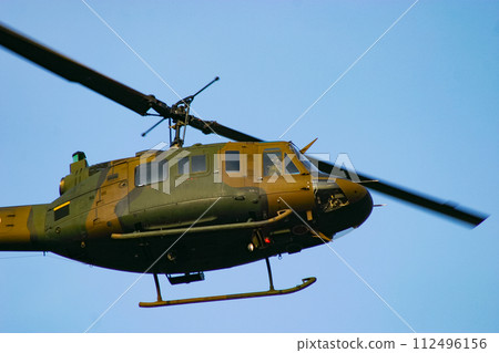Ground Self-Defense Force helicopter UH-1J flying early in the morning 112496156