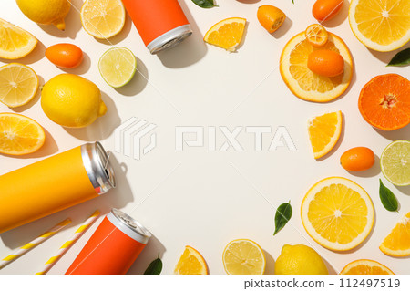 Tin cans and citrus fruits on white background,space for text Tin cans and citrus fruits on white background,space for text 112497519