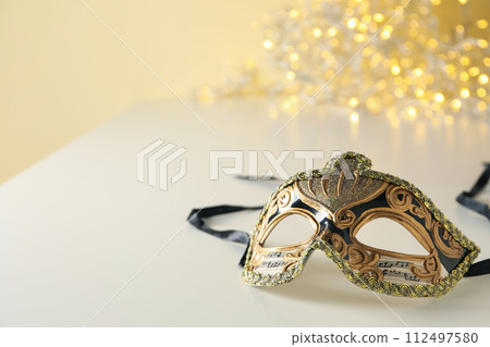 Purim day celebration concept, mask for performance. 112497580