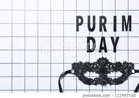 Purim day celebration concept, mask for performance. 112497588