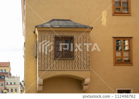 Colorful historic houses in the Old Town of Warsaw city, Poland. Traditional architecture, travel postcard Colorful historic houses in the Old Town of Warsaw city, Poland. Traditional architecture, travel postcard 112498762