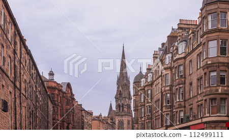 The Edinburgh Barclay Viewforth Church spire rising above charming traditional sandstone tenements 112499111