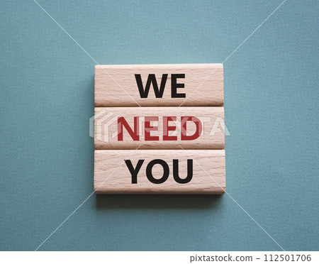 We need you symbol. Concept words We need you on wooden blocks. Beautiful grey green background. Business and We need you concept. Copy space. 112501706