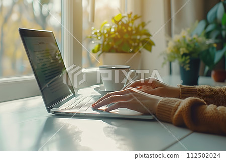 AI-generated content. Cozy autumn work setting with laptop 112502024