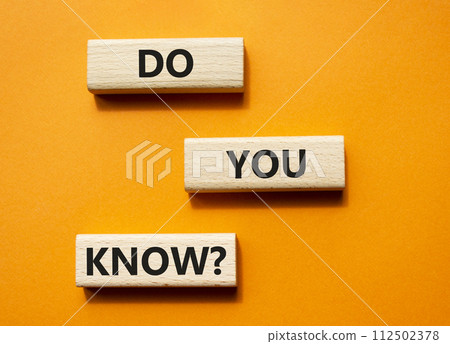 Do you know symbol. Concept word Do you know on wooden cubes. Beautiful orange background. Business and Do you know concept. Copy space. 112502378