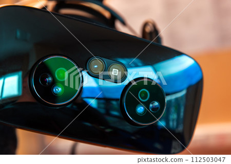 Shiny black VR headset with cameras of augmented reality Shiny black VR headset with cameras of augmented reality 112503047