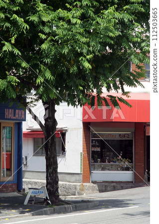 Tobacco shop in downtown area 112503665