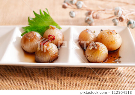 small onions pickled in soy sauce small onions pickled in soy sauce 112504118