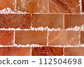 Himalayan pink salt wall in spa or sauna room 112504698