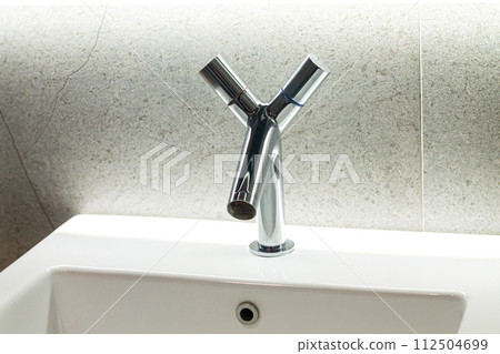 Modern chrome metal faucet and bathroom sink 112504699
