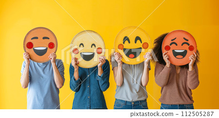 Healthy workplace culture concept. A group of diverse people holding happy emoticons. Teamwork Healthy workplace culture concept. A group of diverse people holding happy emoticons. Teamwork 112505287