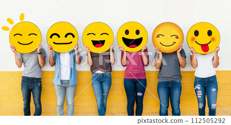 Healthy workplace culture concept. A group of diverse people holding happy emoticons. Teamwork Healthy workplace culture concept. A group of diverse people holding happy emoticons. Teamwork 112505292
